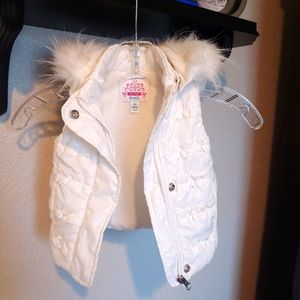 White puffer vest with faux fur hood
